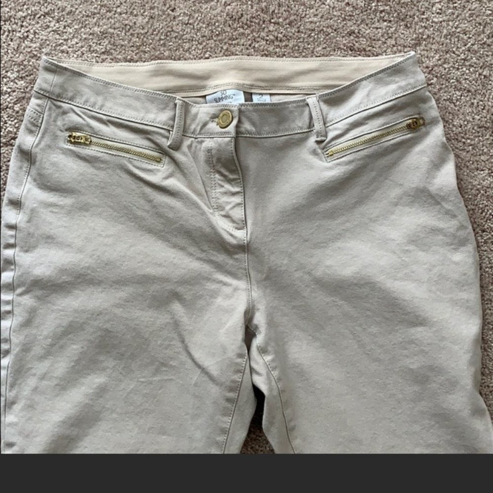 Chico's "So Slimming" cream ankle jeans